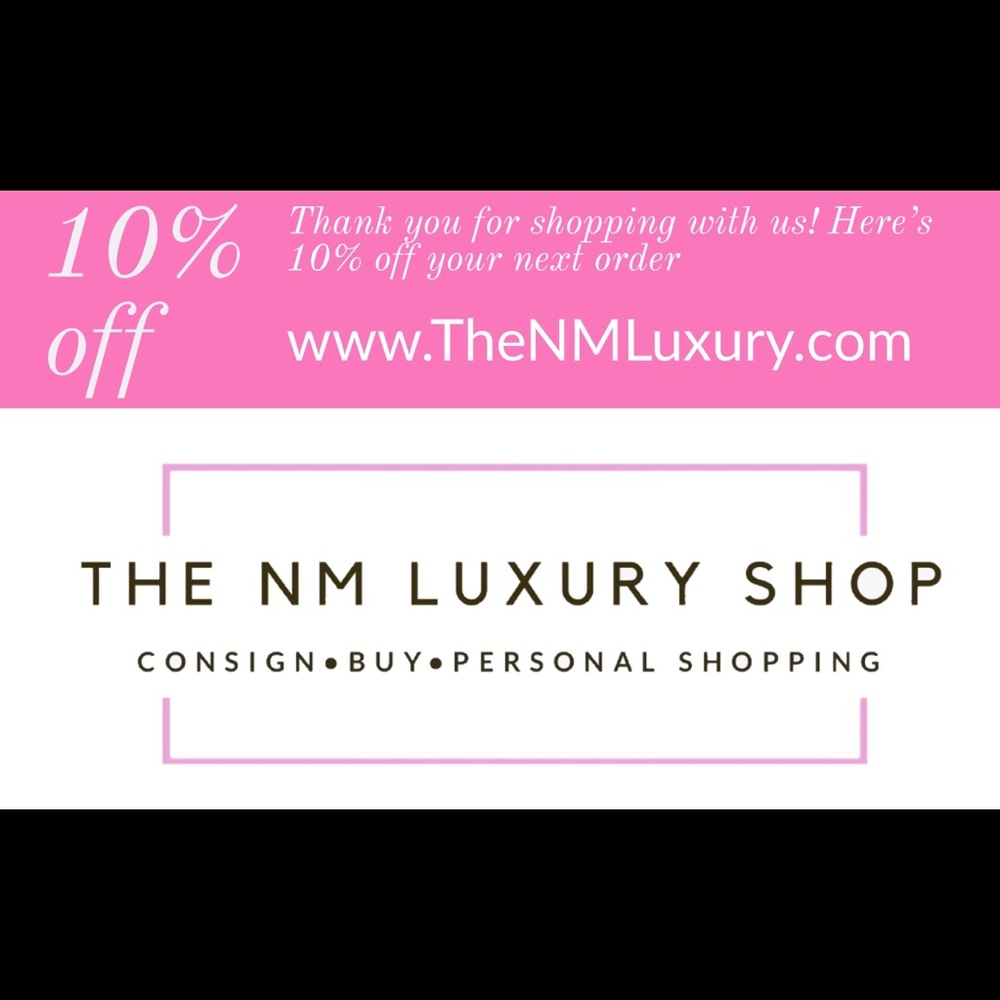 THE NM LUXURY SHOP